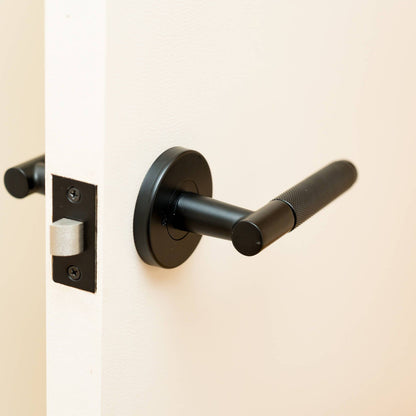 Ikonic Black Matte Knurled Passage Lever Set